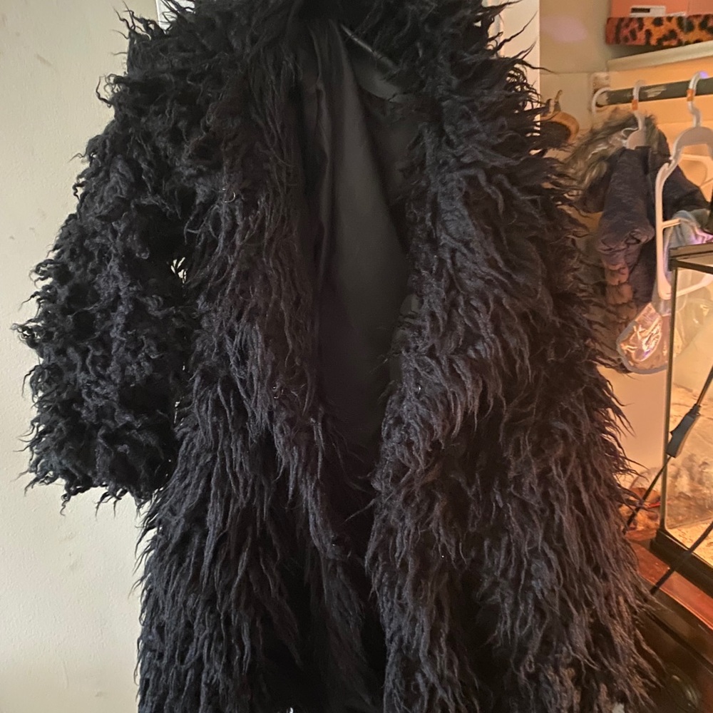Miss fame monster faux fur coat